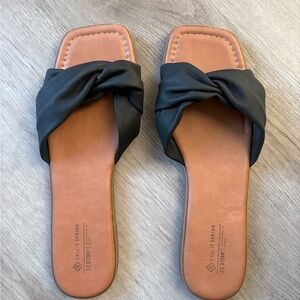 Call It Spring Melonie Women's Black and Tan Flat Sandals